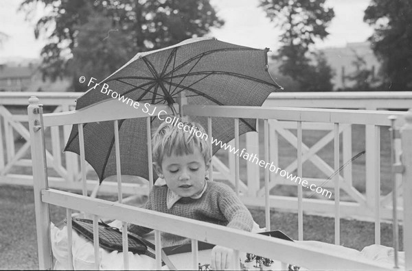 LOURDES HOSPITAL CHILD WITH PARASOL  PADDY GARVEY  20 ST MARYS TERRACE